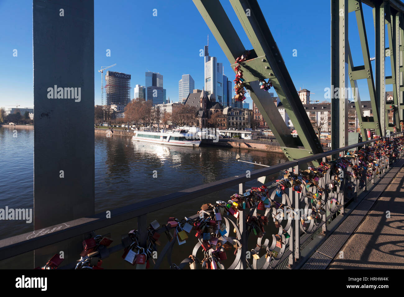 Eiserner Steg, iron footbridge with view to financial district, Frankfurt, Hesse, Germany Stock Photo