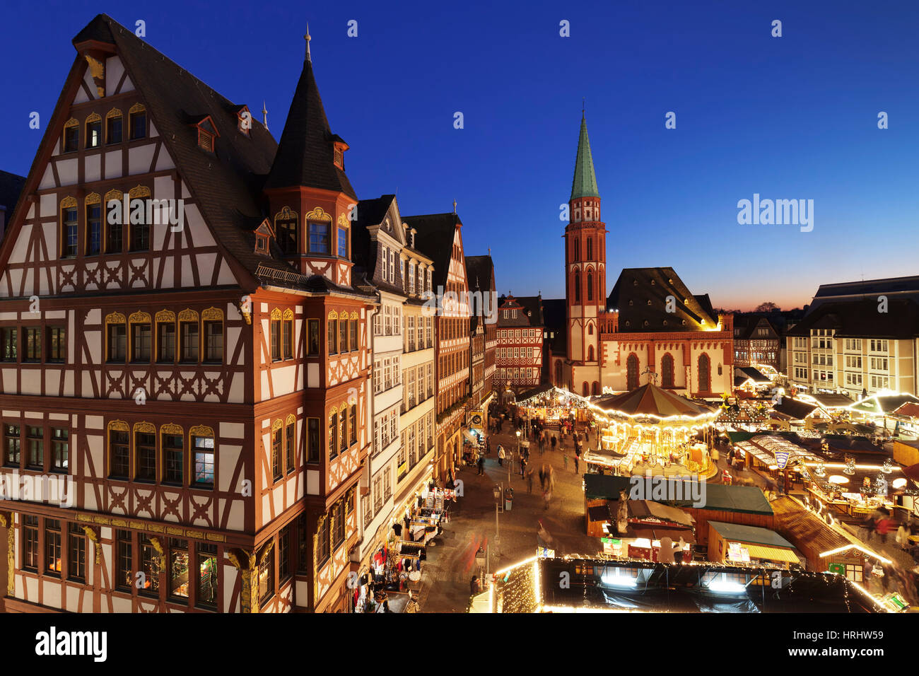 Christmas fair at Roemer, Roemerberg square, Nikolaikirche church, Frankfurt, Hesse, Germany Stock Photo