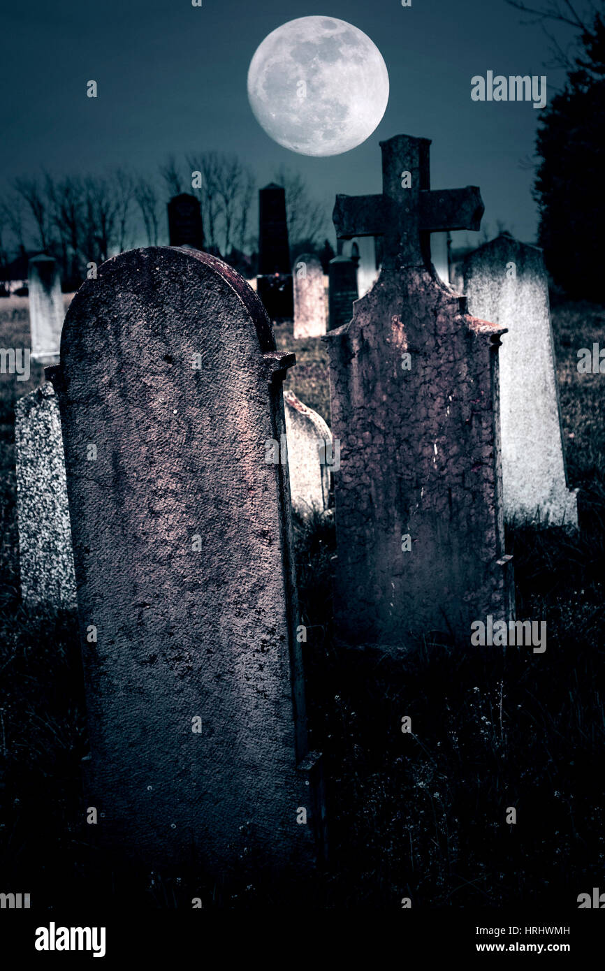 Spooky cemetery at night Stock Photo Alamy