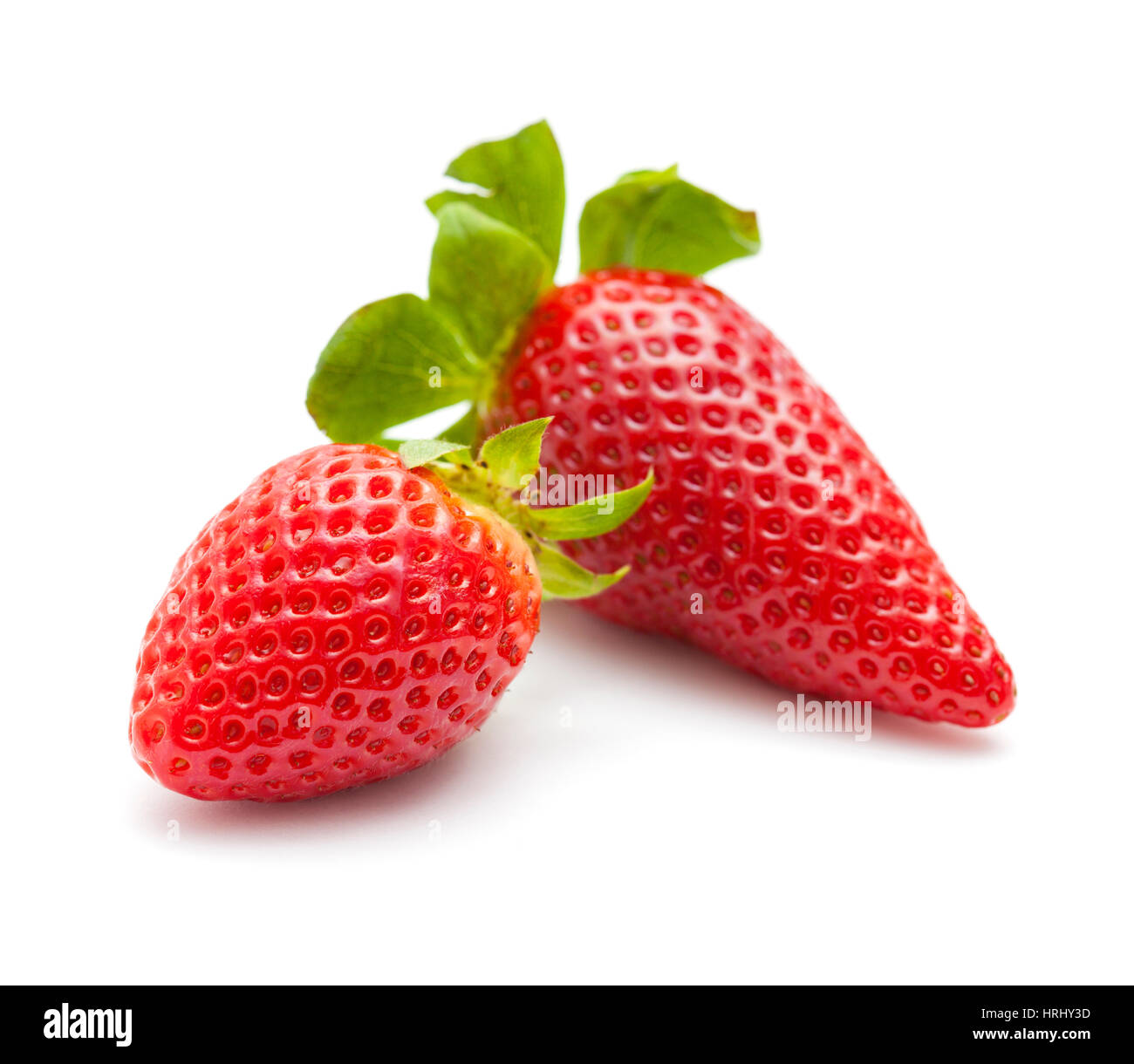 fresh red strawberries isolated on white background Stock Photo - Alamy