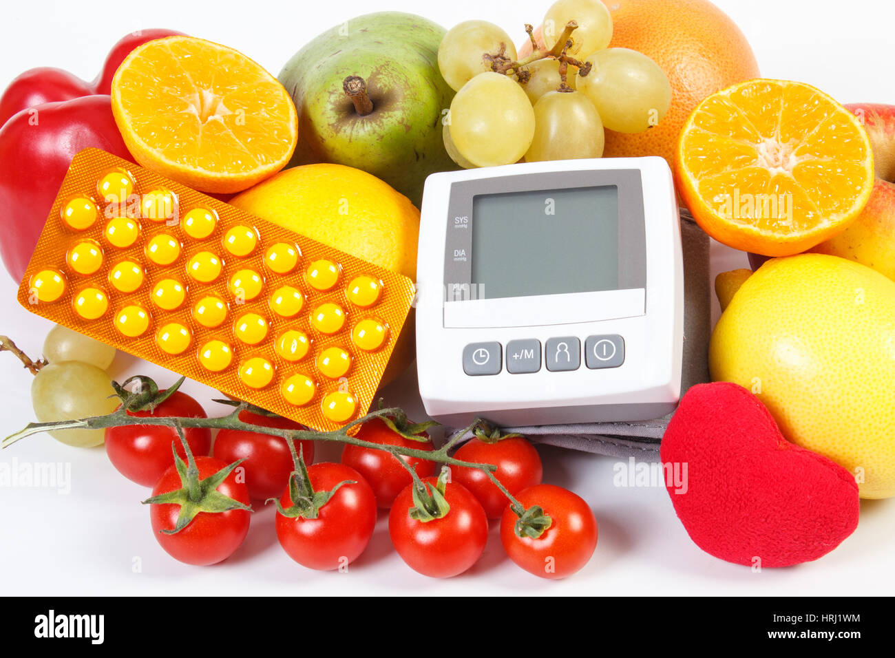 https://c8.alamy.com/comp/HRJ1WM/blood-pressure-monitor-fresh-fruits-with-vegetables-and-medical-pills-HRJ1WM.jpg