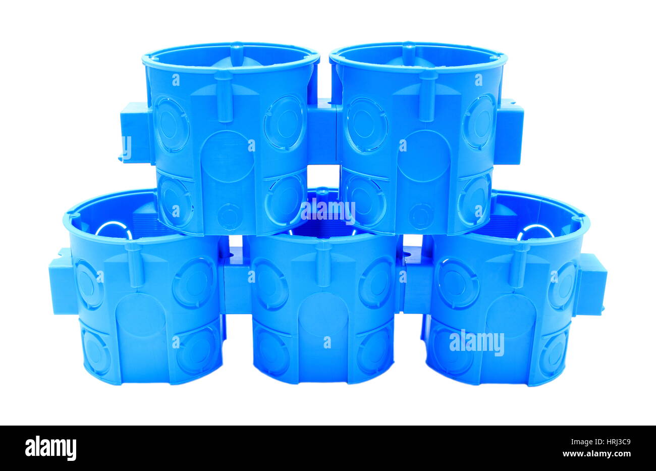 Stack of blue plastic electrical boxes on white background, junction