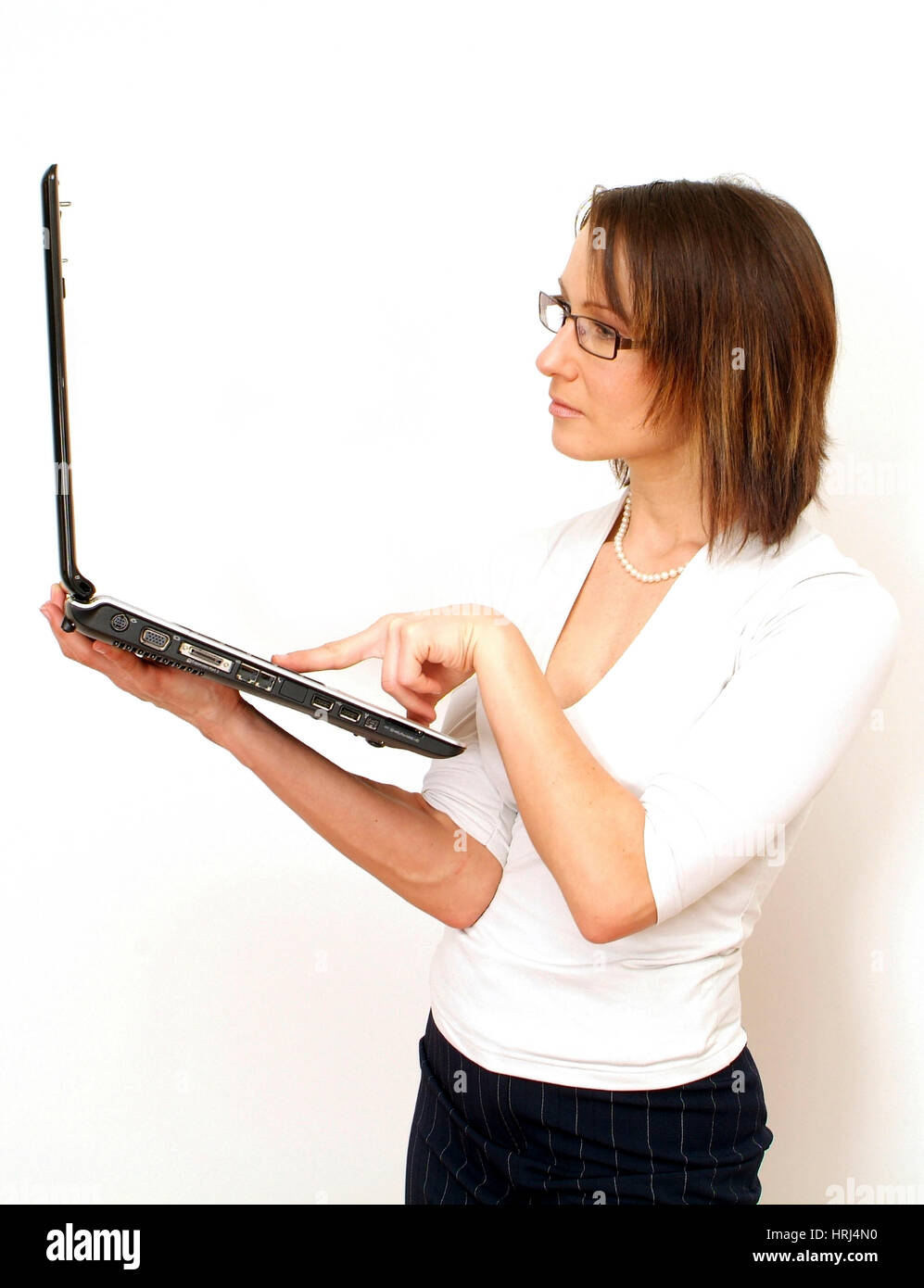 Junge Gesch?ftsfrau arbeitet am Laptop - young business woman using laptop, Symbolfotos Stock Photo