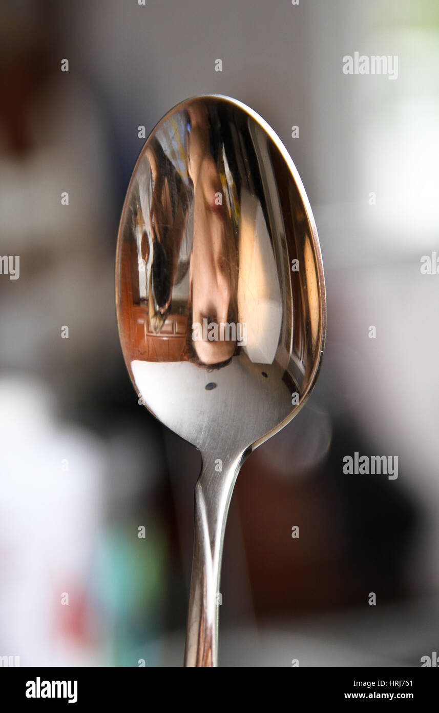 Inverted Reflection in Spoon Stock Photo