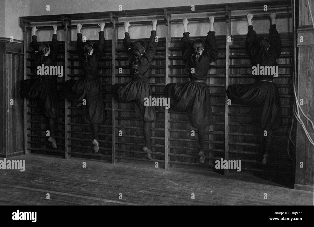Girls on Climbing Apparatus, 1899 Stock Photo