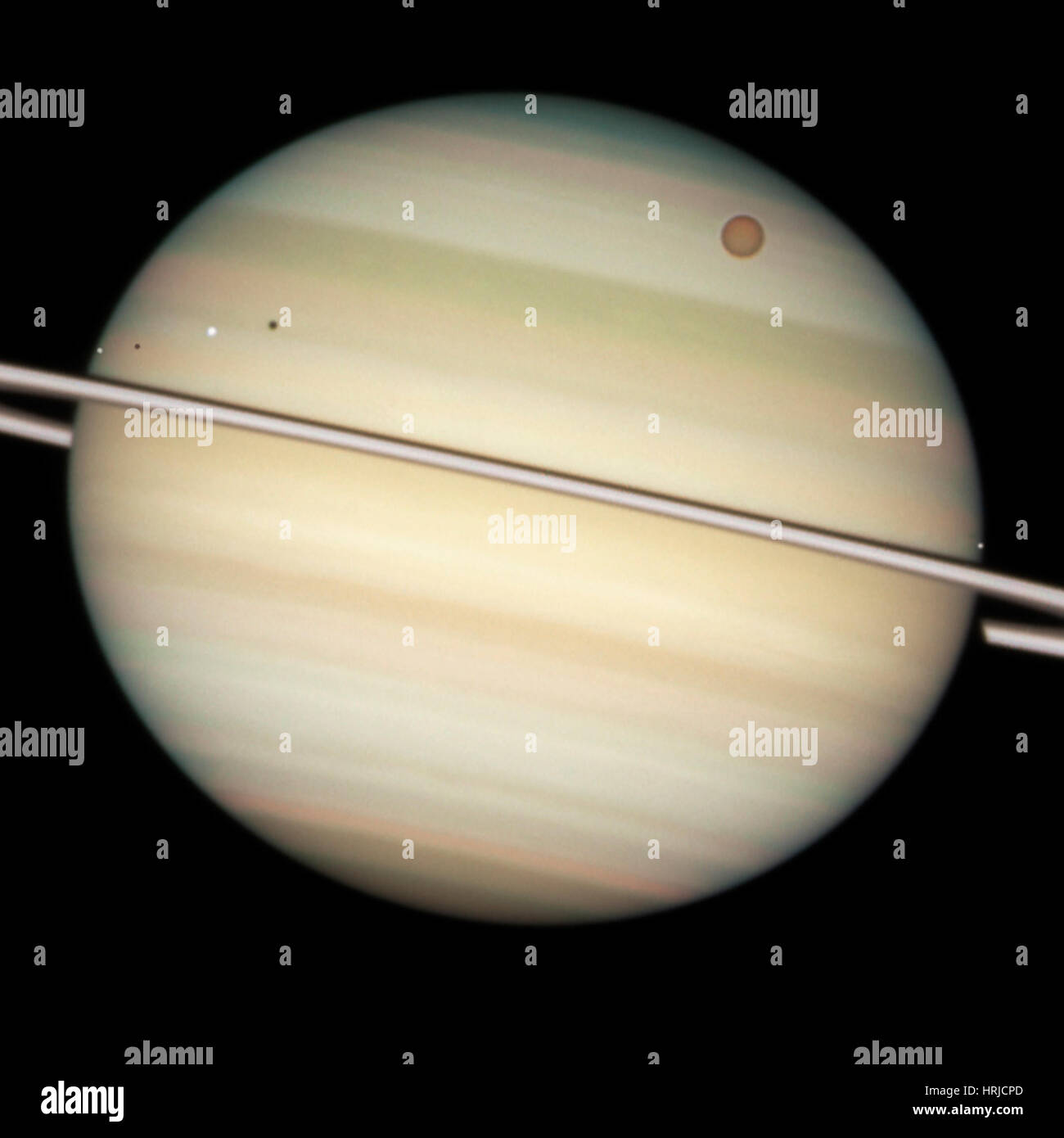 Transit Of Saturn's Moons Stock Photo