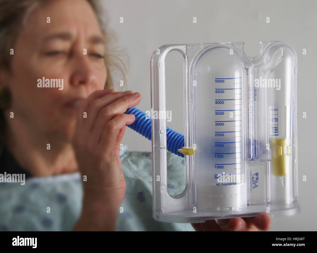 Woman doing a Spirometry Test Stock Photo Alamy