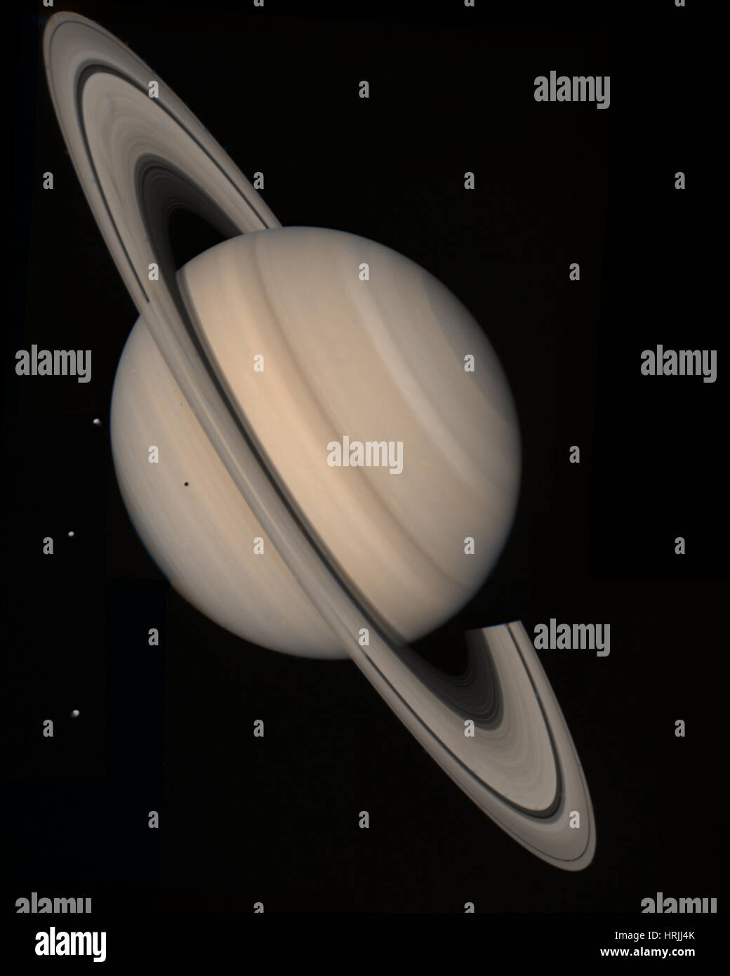 Saturn with Tethys, Dion and Rhea, Voyager 2 Stock Photo