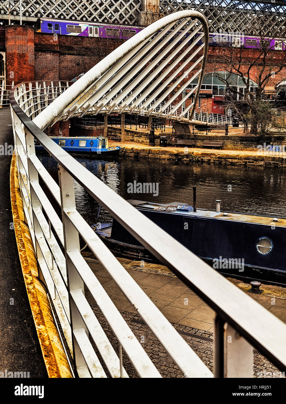 Modern Bridge Crossing Canal Basin Stock Photo