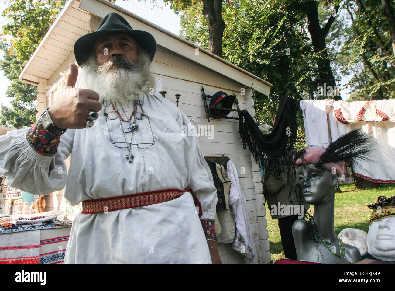 Targu Mures, Romania, September 25, 2009: An old craftsman dressed in a  traditional costume poses during the Fair of craftsmen organized in Targu  Mure Stock Photo - Alamy