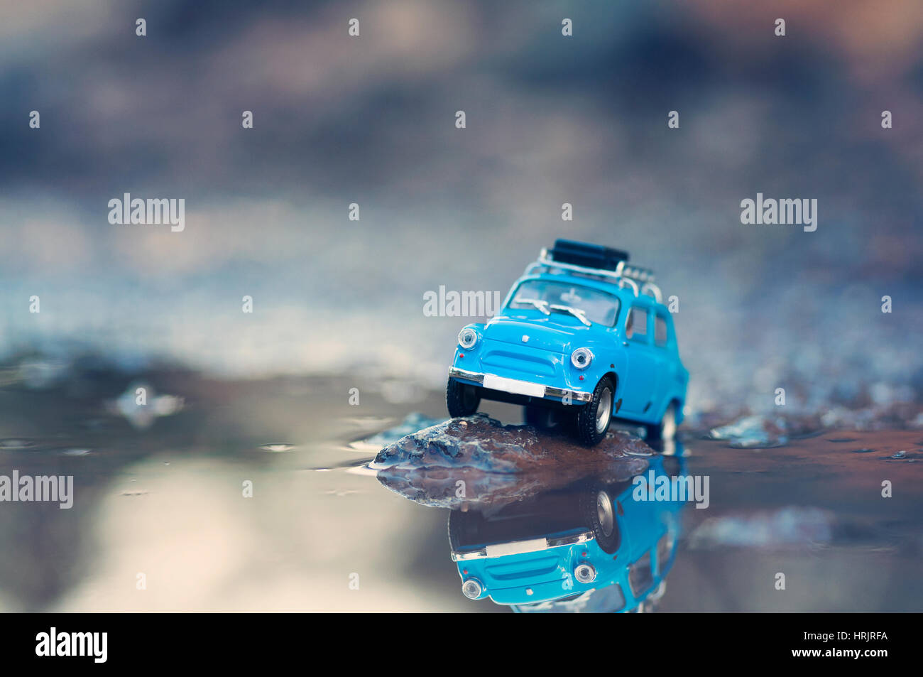 Miniature travelling car with luggage on top. Macro photography Stock Photo