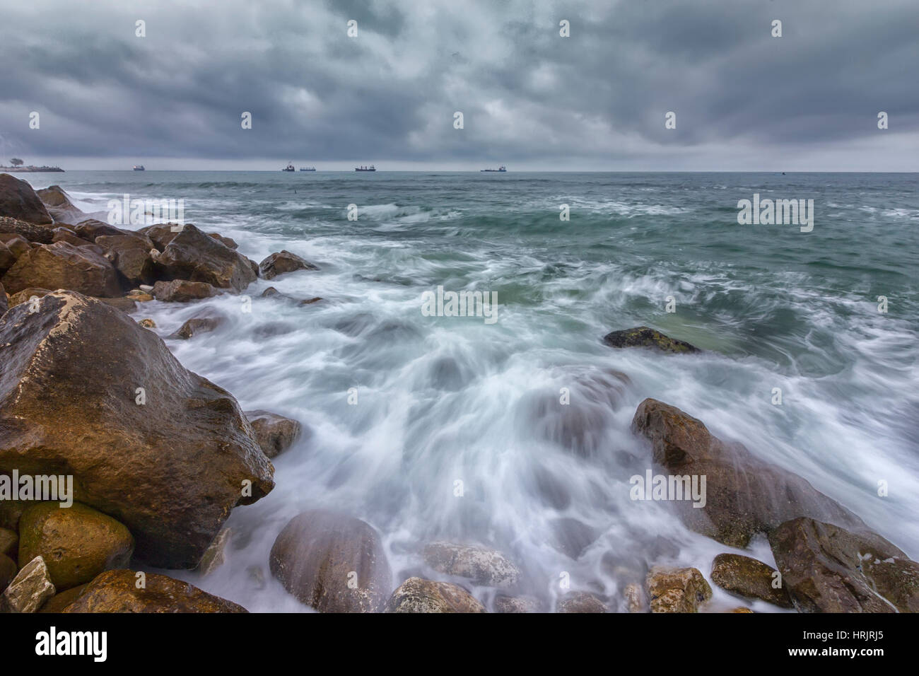 Cloudy, cold day. Stunning long exposure day seascape. Stock Photo