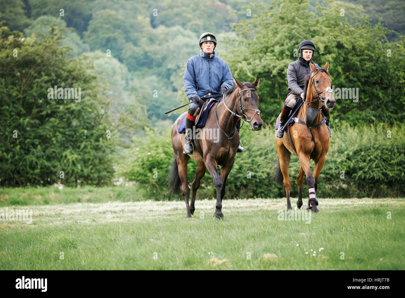 Two boys riding horses hi-res stock photography and images - Alamy