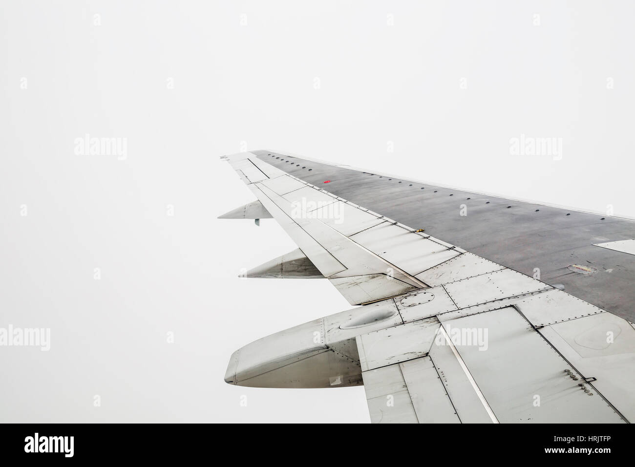 Grey aeroplane wing hi-res stock photography and images - Alamy