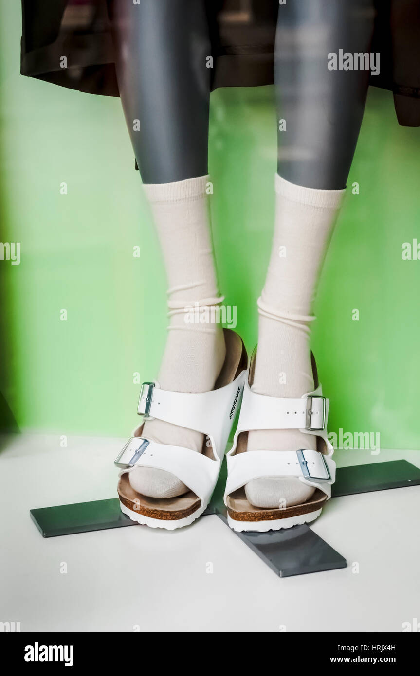 A shop window display of a pair of white Birkenstock sandals and socks  Stock Photo - Alamy