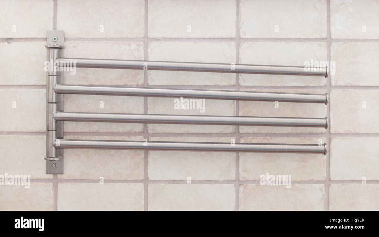 Metal towel rack in a modern bathroom Stock Photo - Alamy
