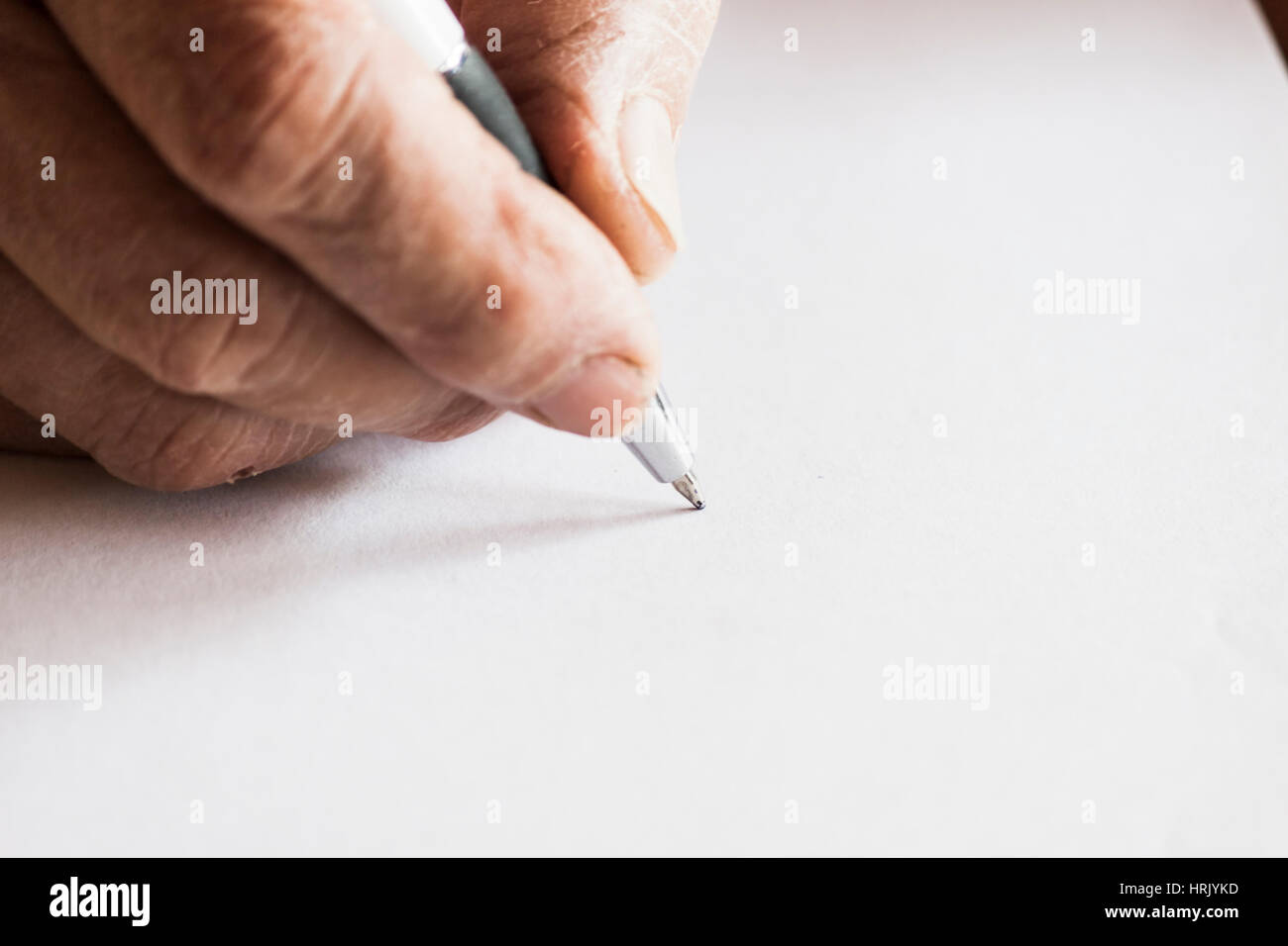 Writing on white paper Stock Photo - Alamy