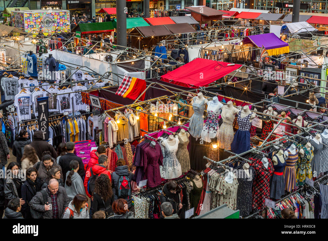Old Spitalfields Market in East London, on a popular Sunday morning is packed with artisans and traders offering all kinds of merchandise, England UK Stock Photo