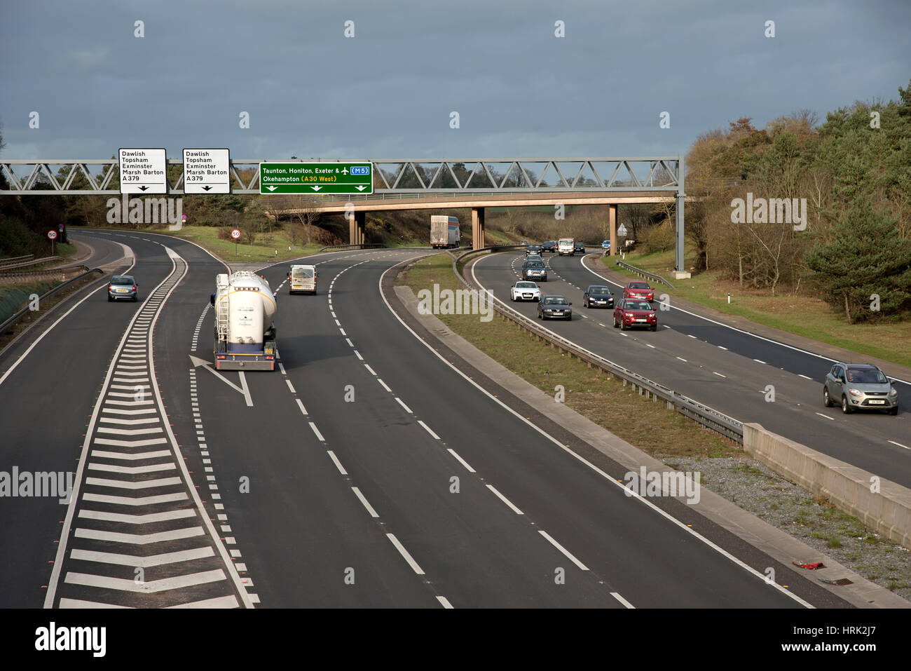 A three lane highway travels east towards Exter in Devon England UK Stock Photo