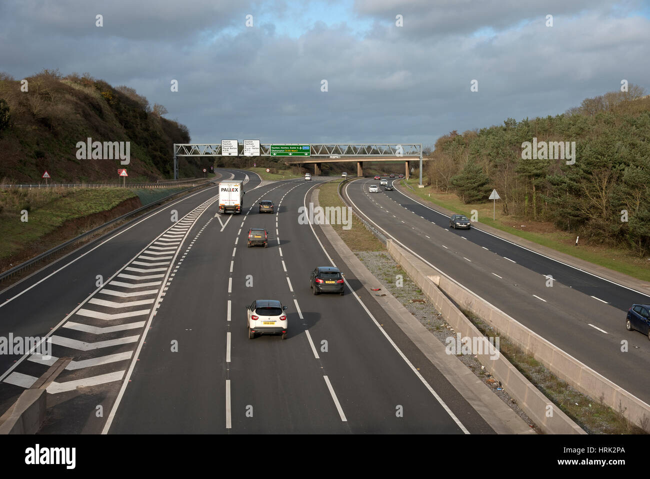 A three lane highway travels east towards Exter in Devon England UK Stock Photo