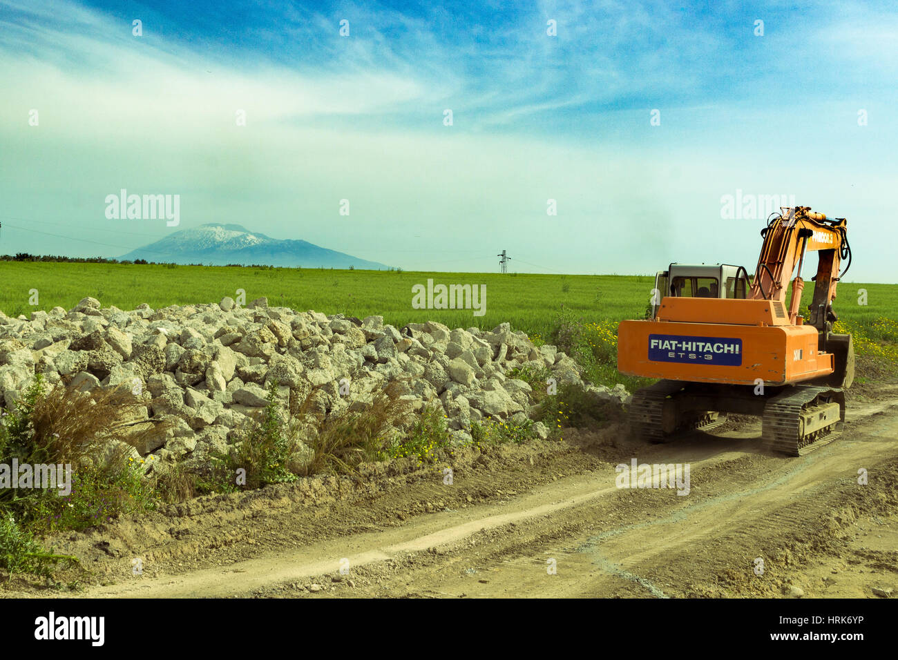 the red excavator in a day's work Stock Photo - Alamy