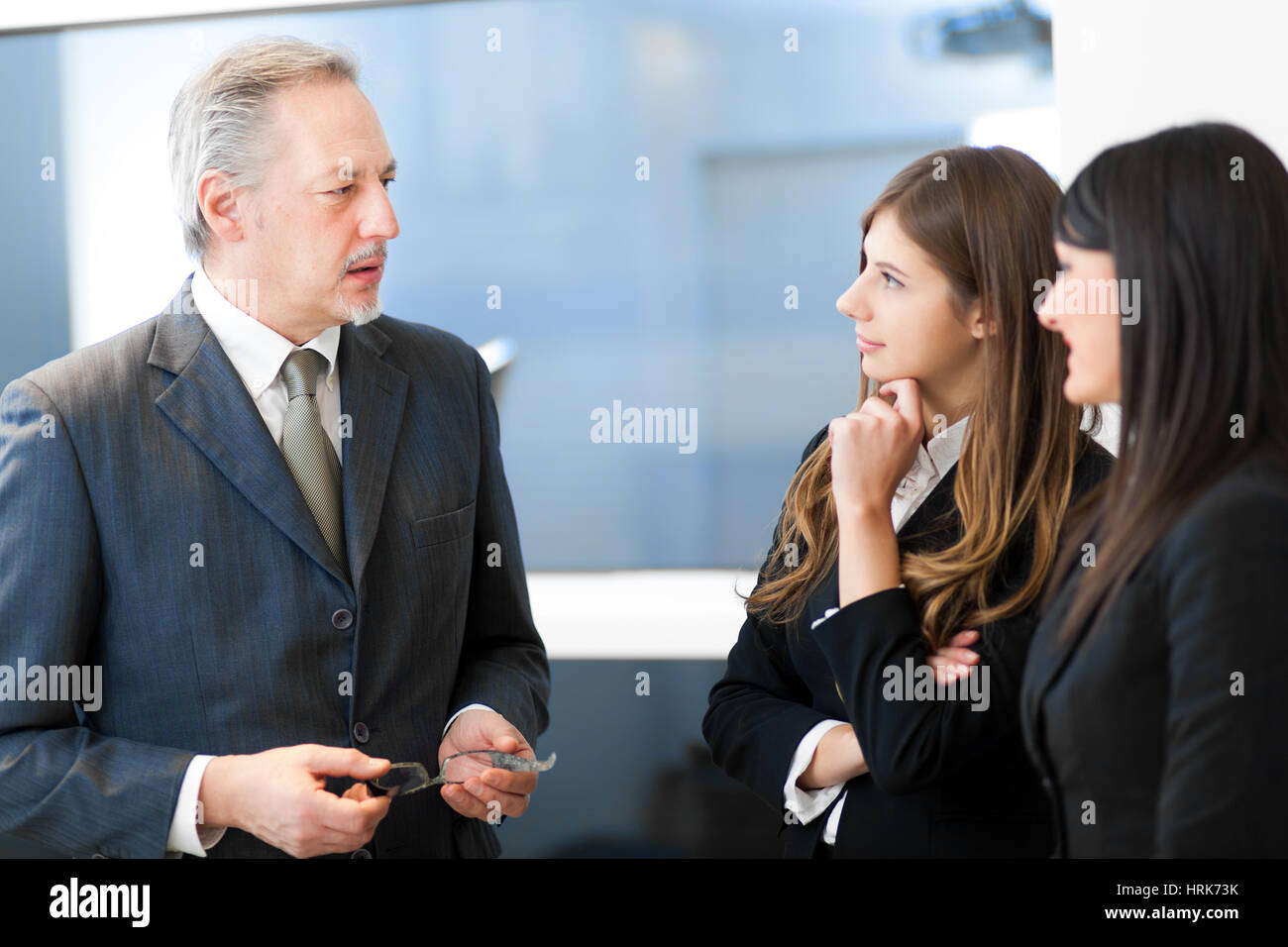 Group of business people at work in their office Stock Photo - Alamy