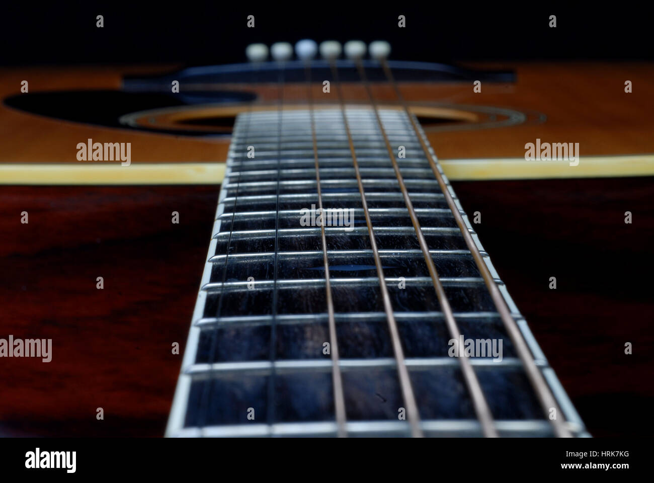 looking down acoustic guitar neck Stock Photo