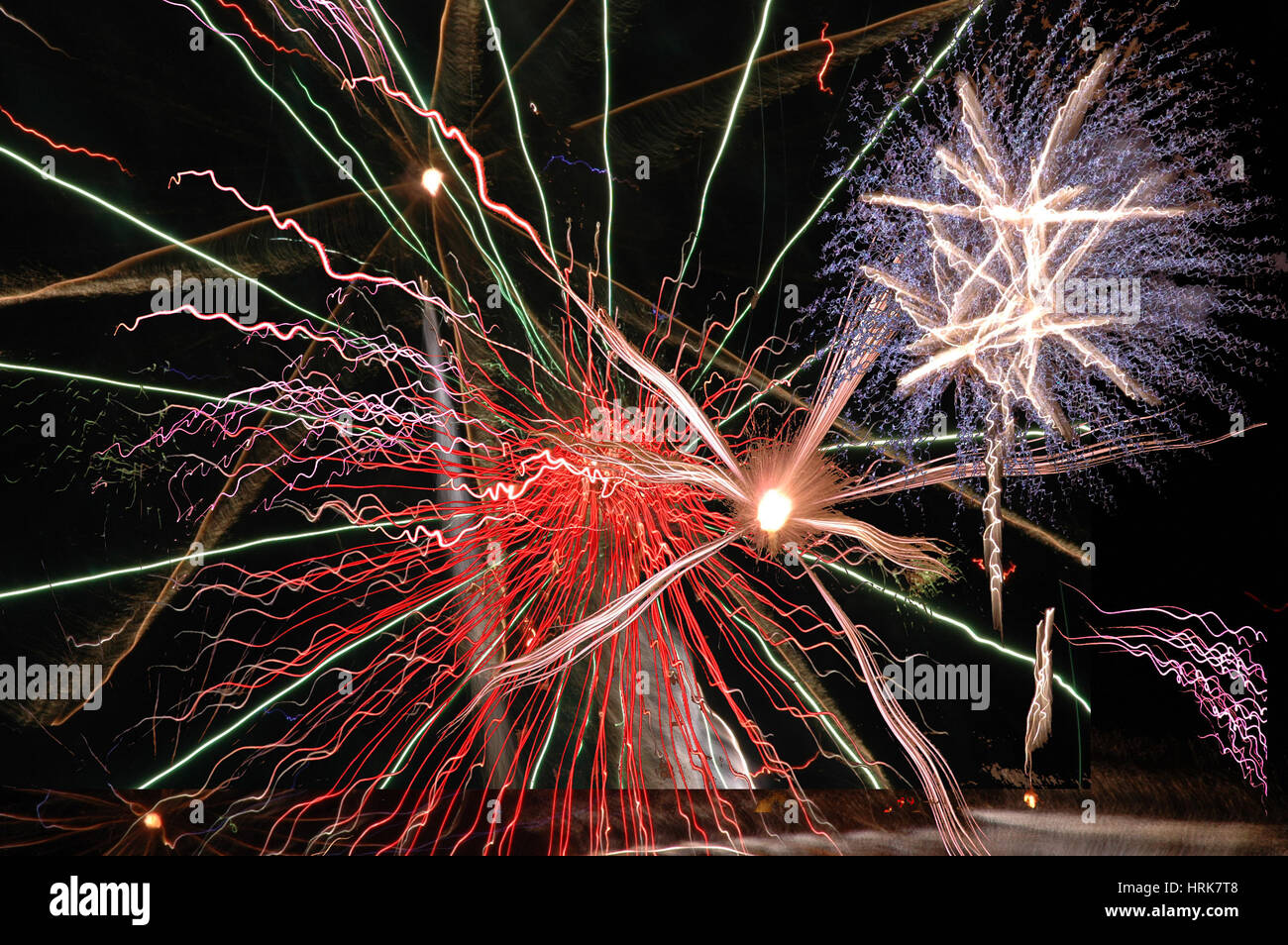 multiple fireworks exploding in the skies Stock Photo