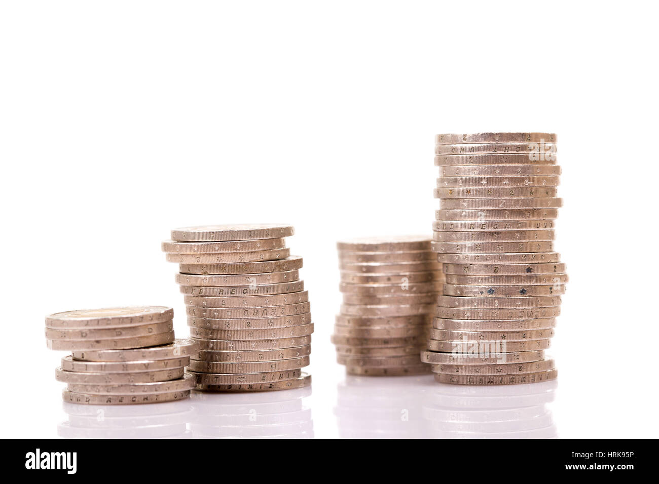Heap of two euro coins isolated on white background Stock Photo - Alamy