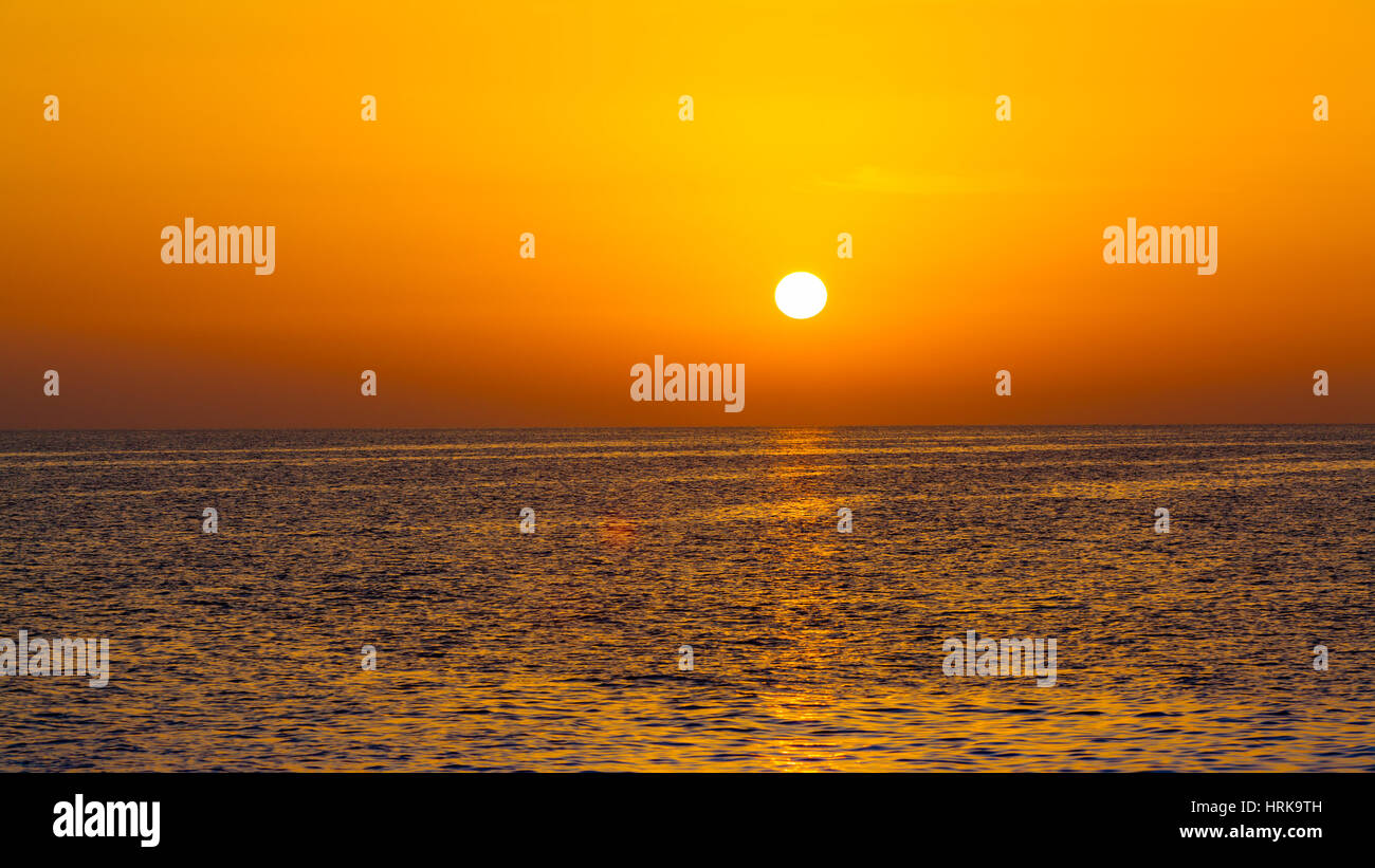 beautiful sunset above the sea. Sunset Sky Stock Photo - Alamy