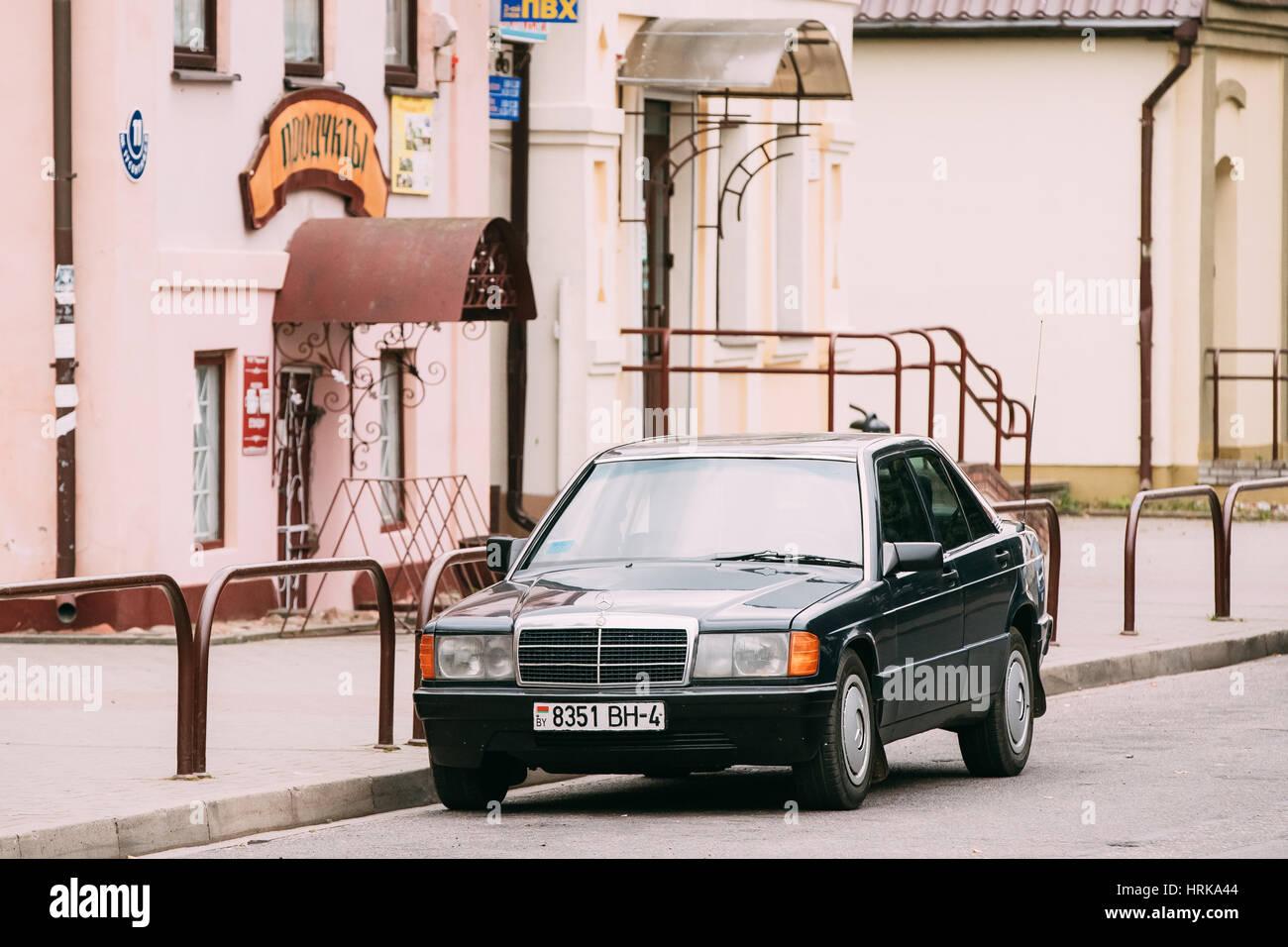 Mir, Belarus - September 1, 2016: Old car 1996 Mercedes-Benz 190 E (W201) sedan parking on street. First compact executive car from Mercedes-Benz intr Stock Photo