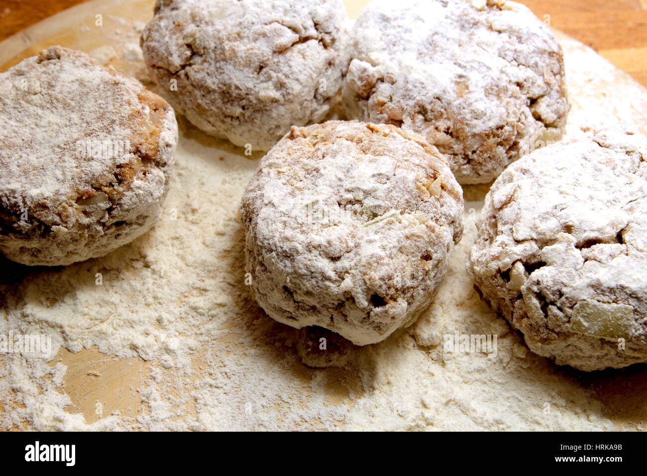 Rissoles, made from minced meat, onion and breadcrumbs, rolled in flour ...