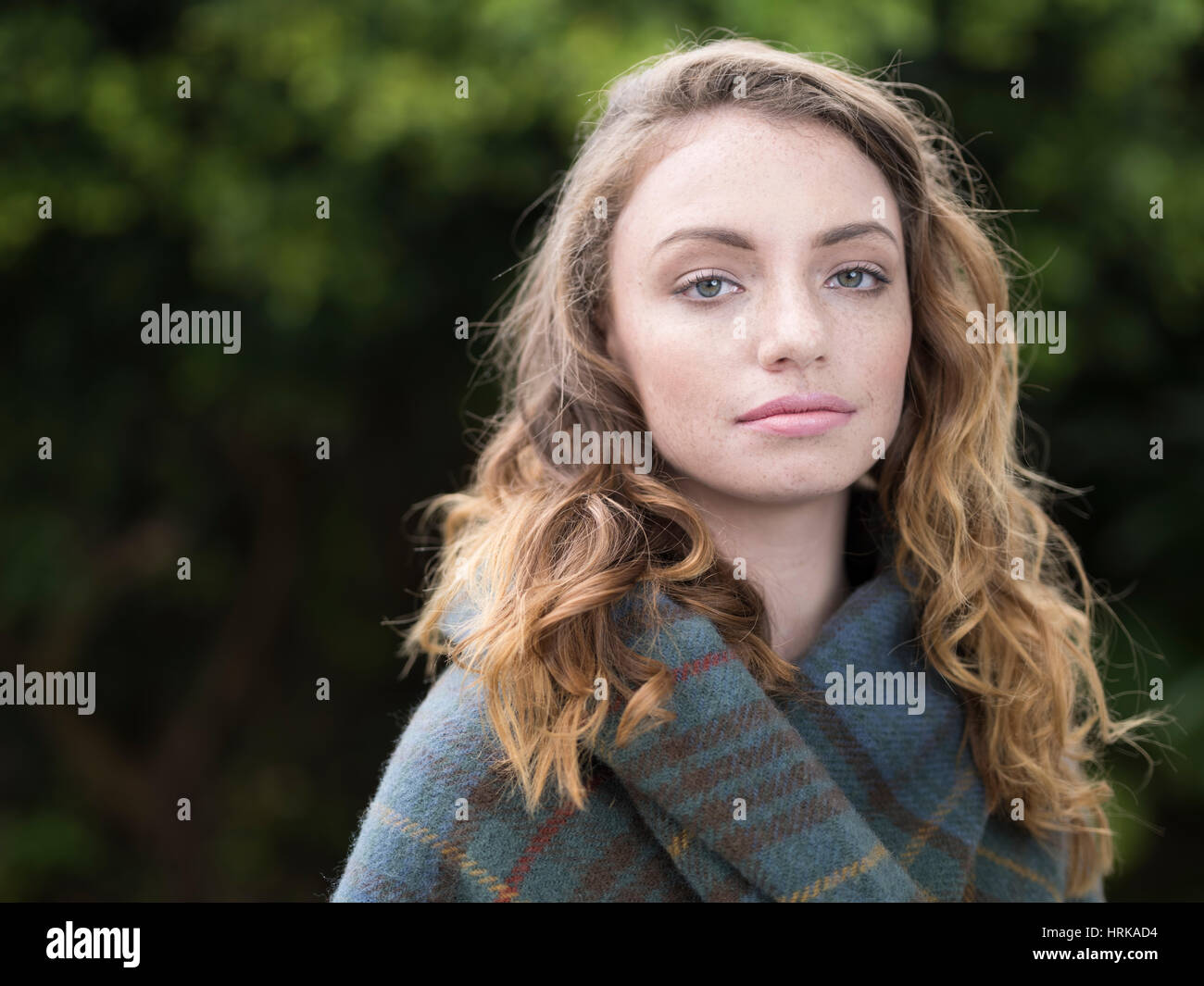 Young woman with Antique Hunting Stewart tartan shawl Stock Photo