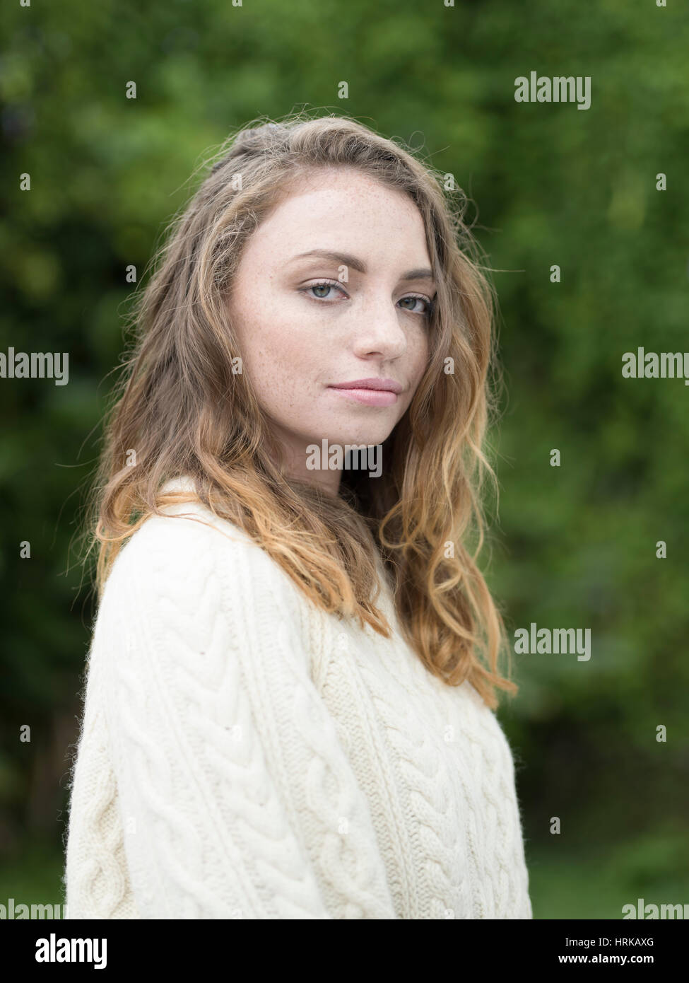 Young woman wearing Aran jumper Stock Photo