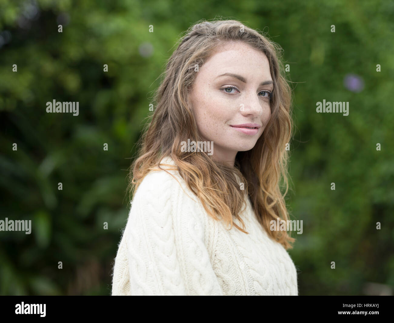 Young woman wearing Aran jumper Stock Photo