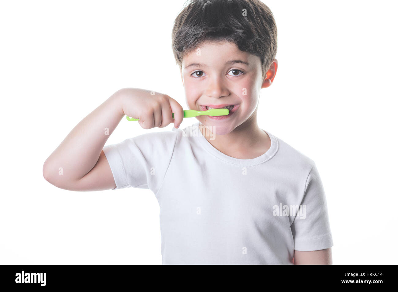 smiling child brushes his teeth Stock Photo Alamy