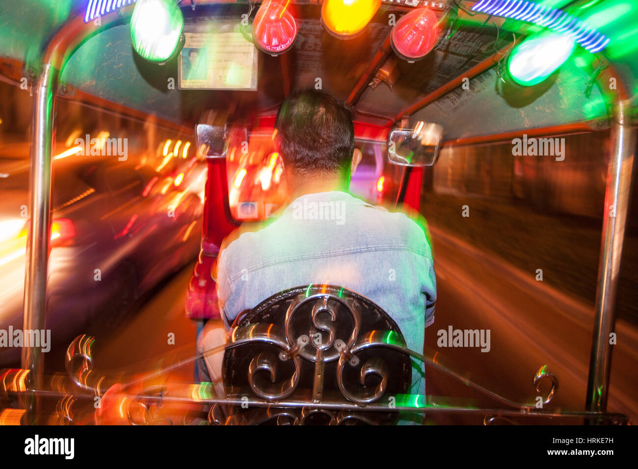 Brightly,lights,lit,colour,colourful,tuk-tuk,tuk,tuk,tuk tuk,auto,rickshaw,taxi,blur,motion,speed,movement,Bangkok,Thailand,Thai,Asia,Asian, Stock Photo