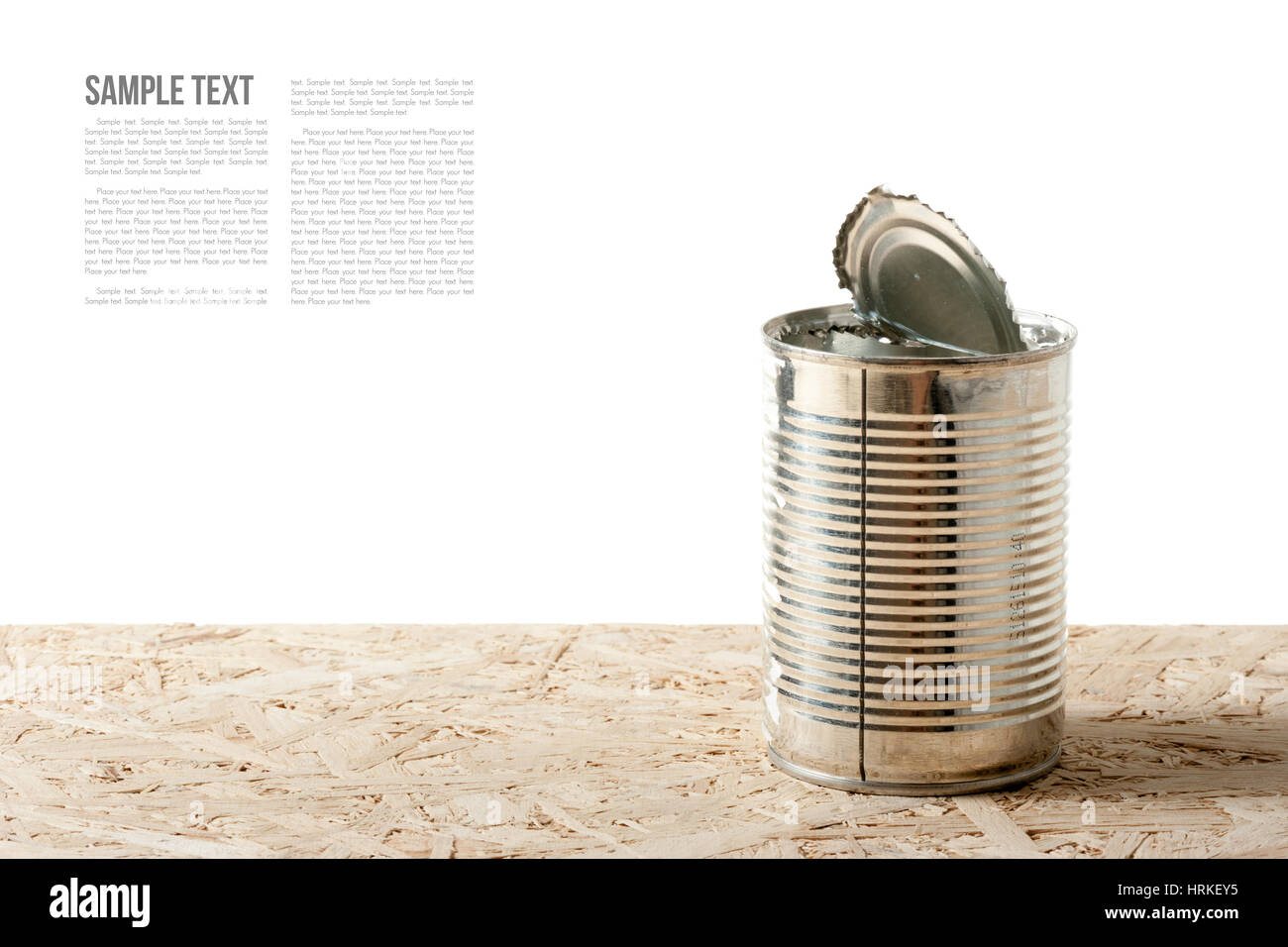 closeup opened tin on wooden desk, isolate object Stock Photo