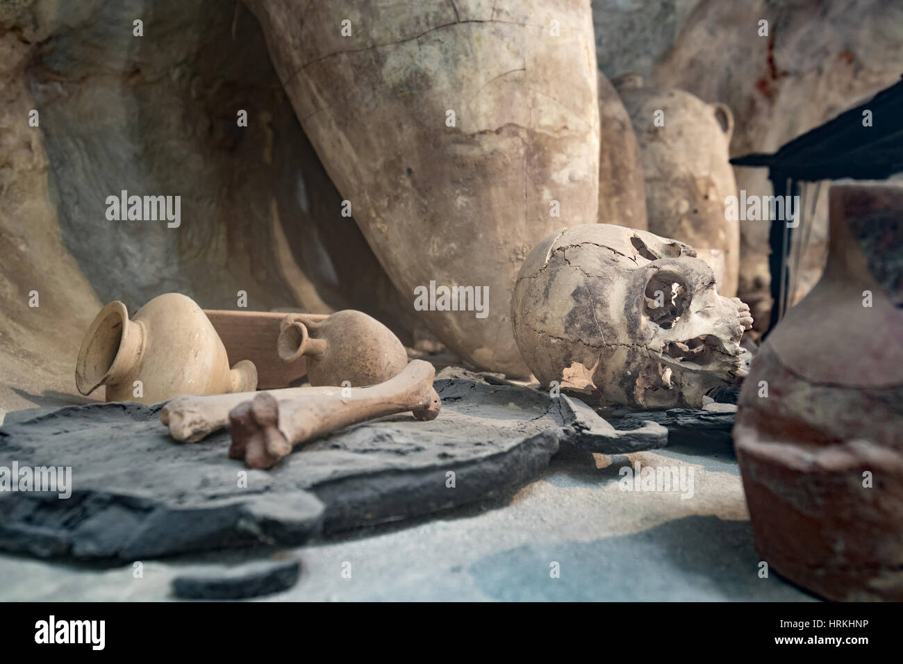 Ancient burial site with a skull and pottery from another milenium Stock Photo