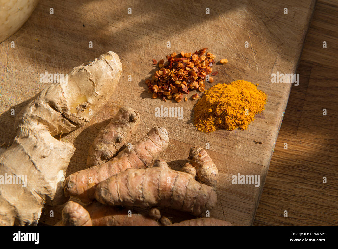 An assortment of fresh and dried spices. Chilli, Ginger and Tumeric