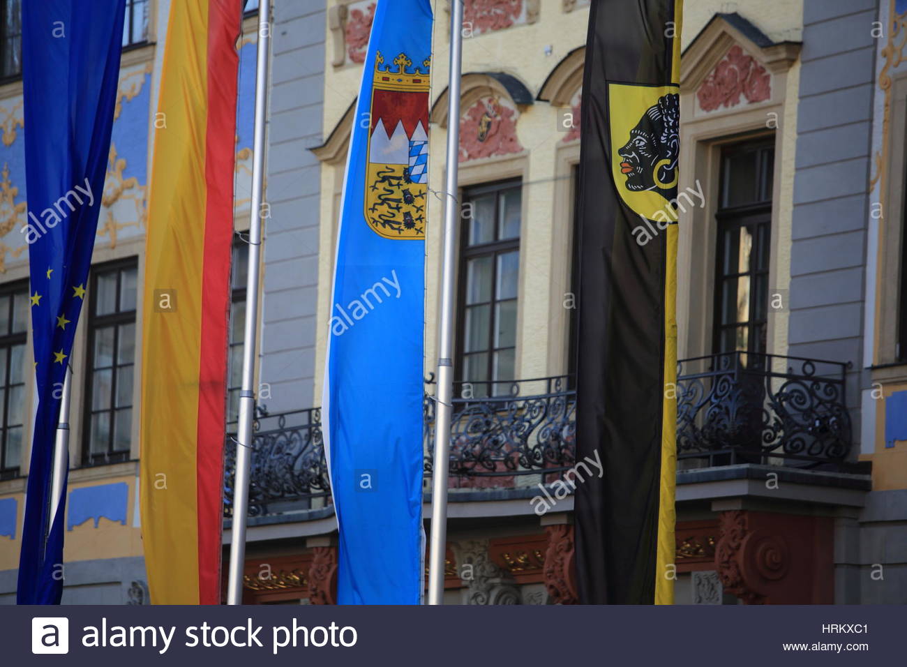Four flags hang on the town hall of Coburg in Bavaria Stock Photo