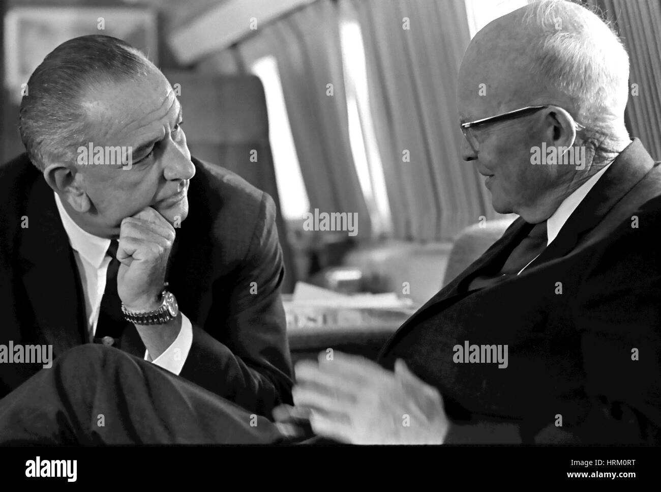 DWIGHT D. EISENHOIWER former US President  at right in conversation with President  :yndon B. Johnson on board Air Force One in October 1965. Photo: Yoichi Okamoto/White House official Stock Photo