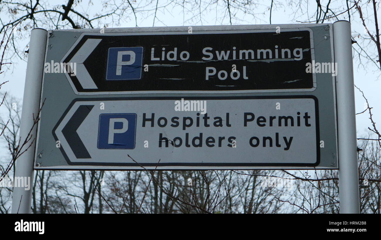 Traffic signs for hospital and swimming pool parking,close up, Cheltenham,UK Stock Photo