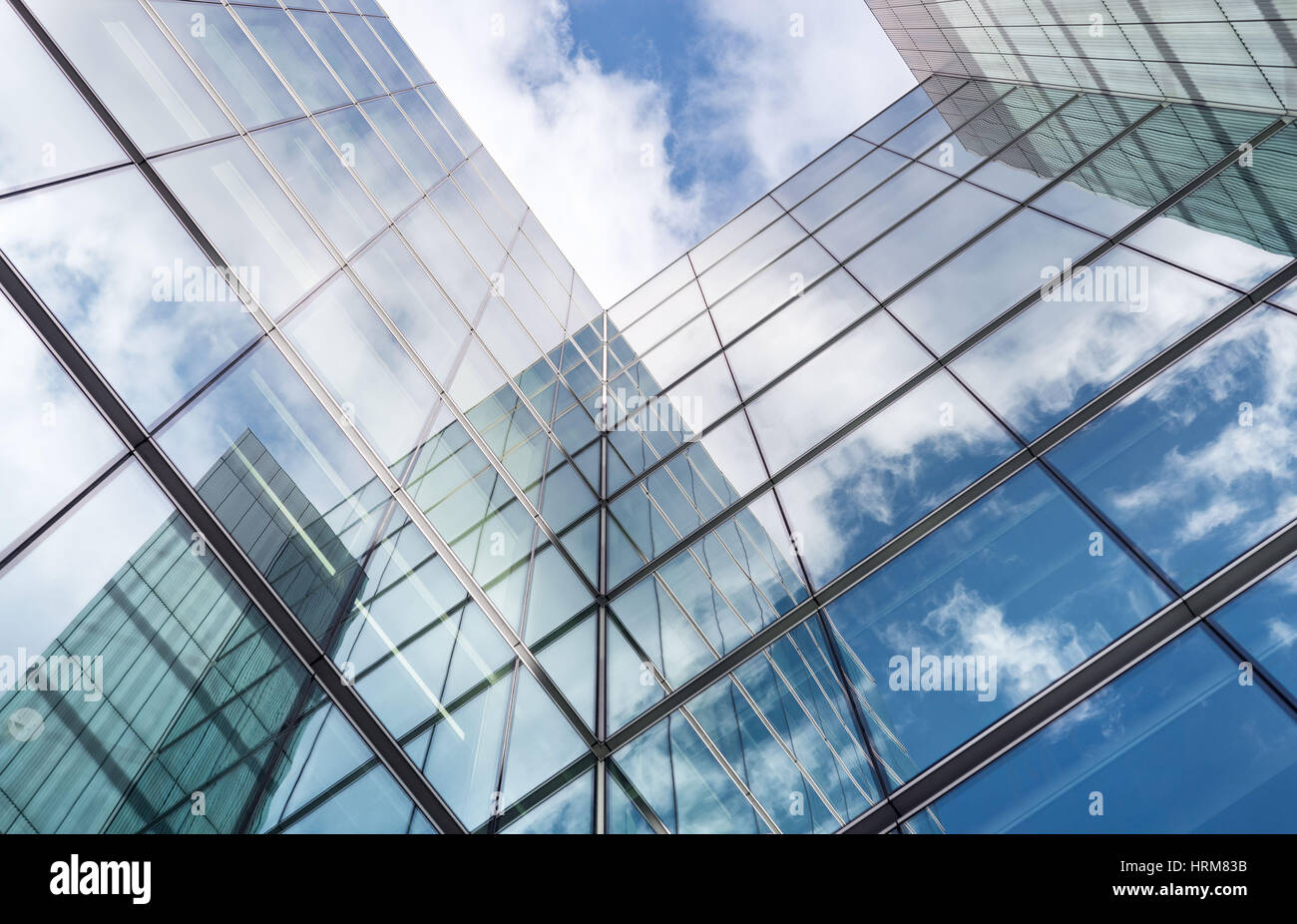Low angle view of tall corporate glass building. Southwark, London Stock Photo