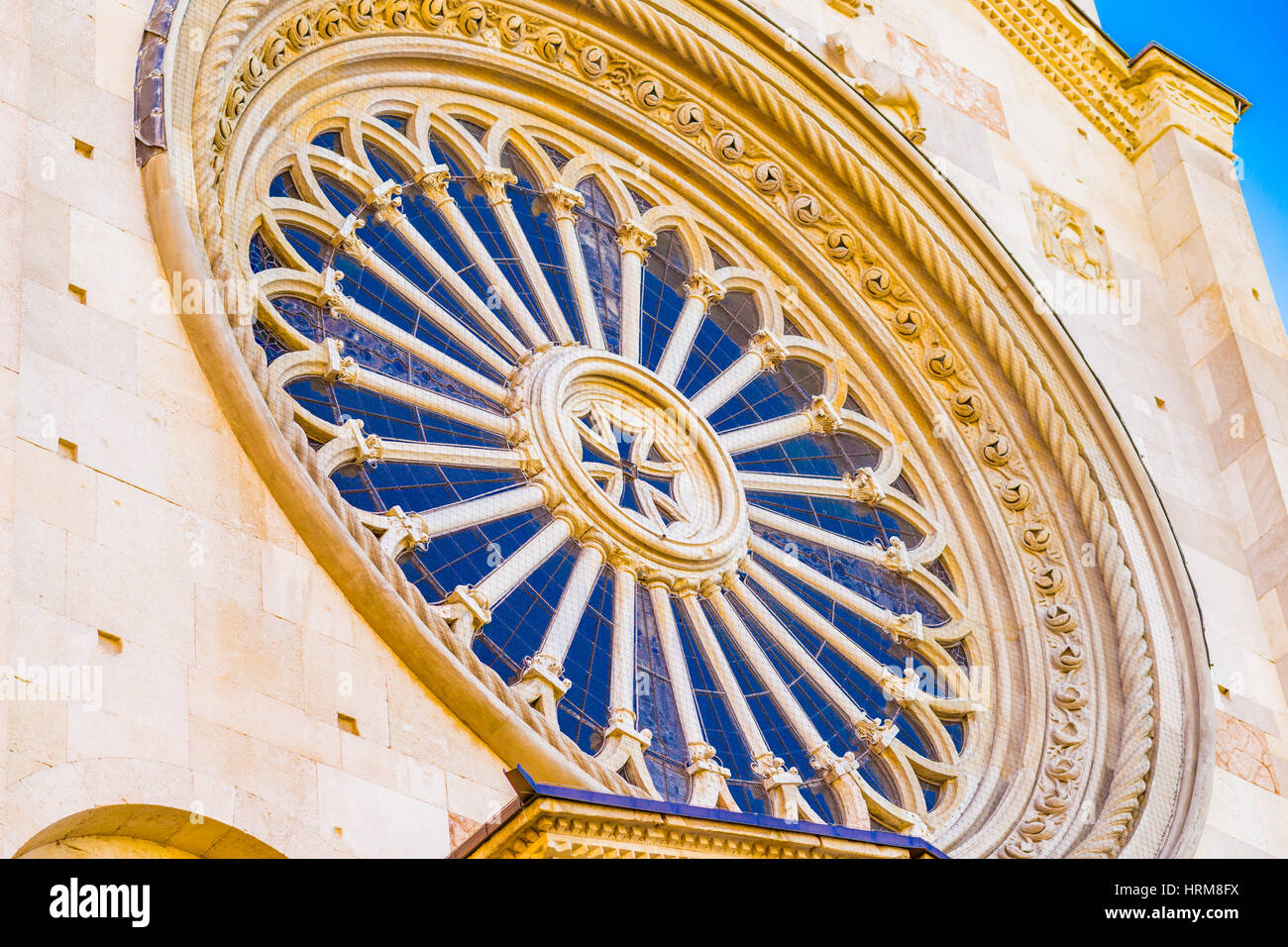 Roman Catholic Rochet rosette of Romanesque Catholic church in Italy Stock Photo - Alamy