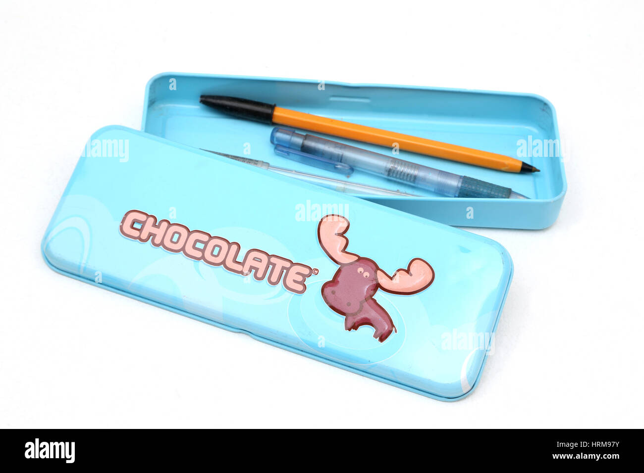 Chocolate Tin Pencil Case With Pens Stock Photo Alamy