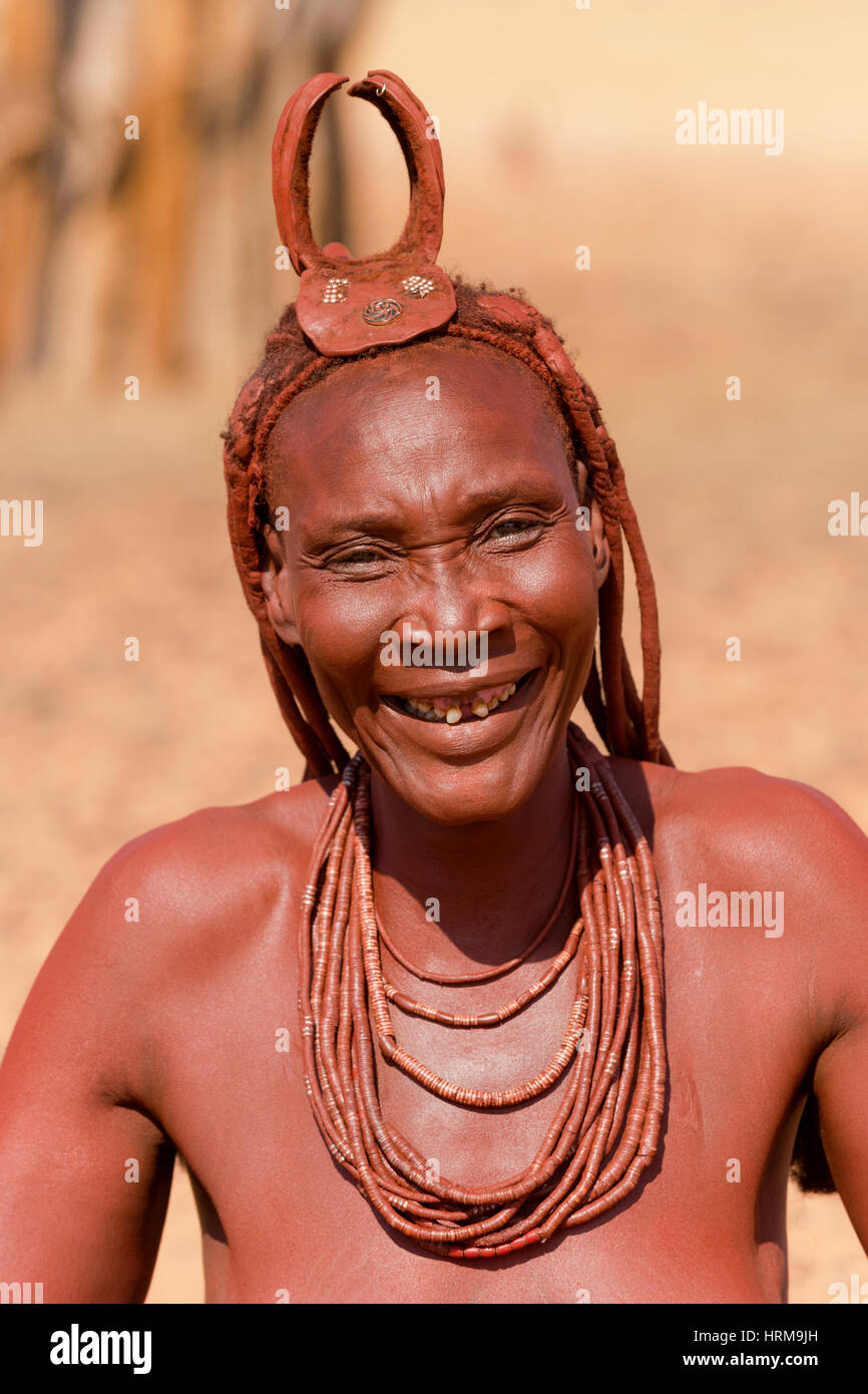 Himba mother portrait, taken close to The Kunene River, Kaokoland, Namibia. Stock Photo