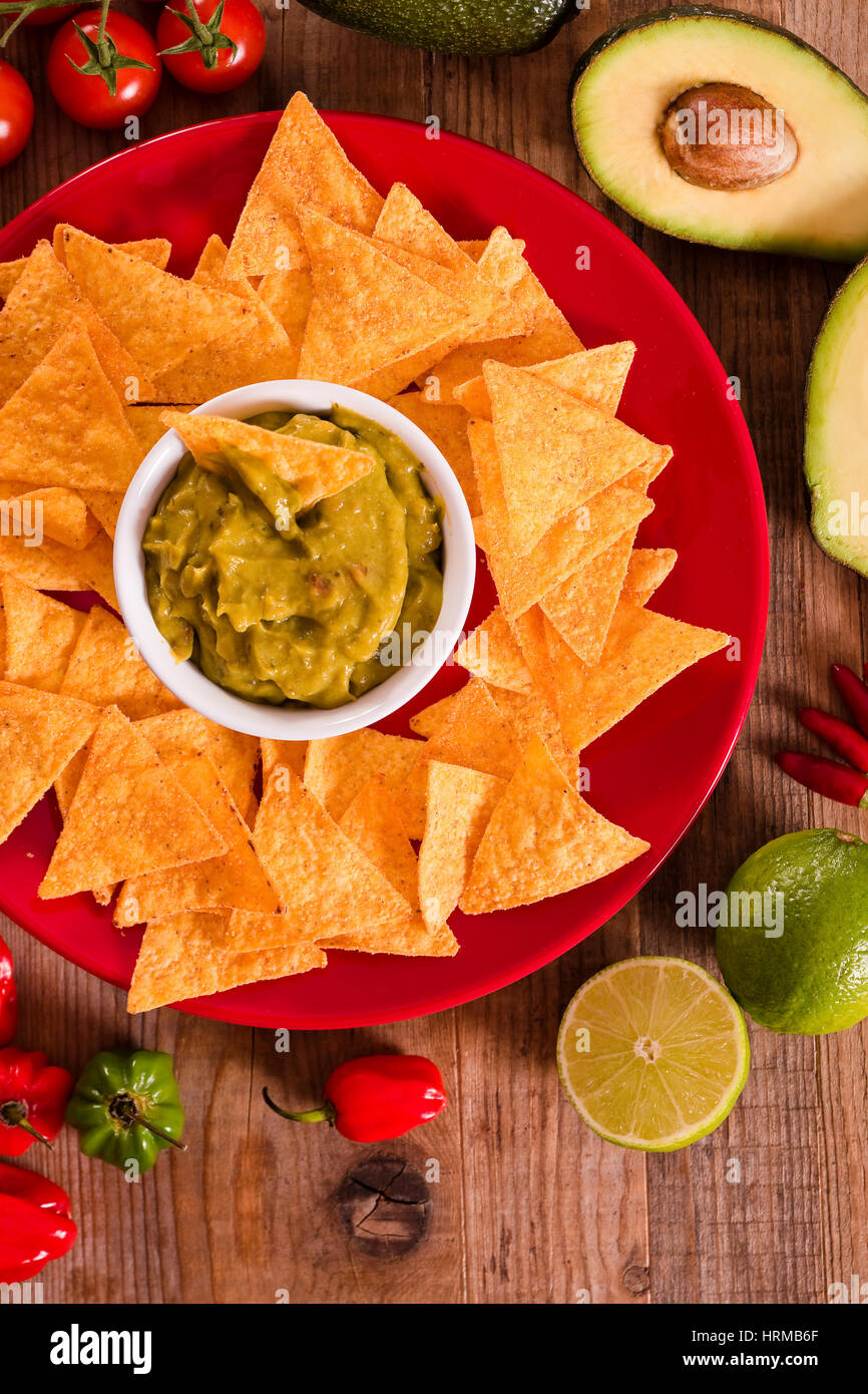Guacamole and nacho chips Stock Photo Alamy