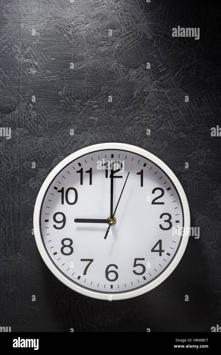 wall clock at black background texture Stock Photo Alamy