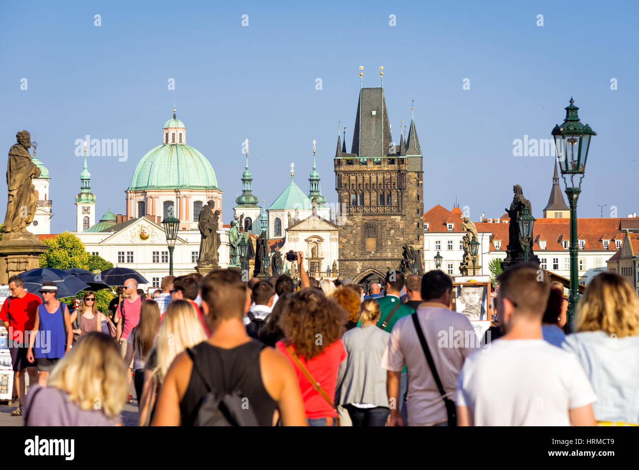 PRAGUE, CZECH REPUBLIC - SEPTEMBER 07, 2016: Bustling crowd at Charles Bridge (Karluv most) facing the old town. Stock Photo